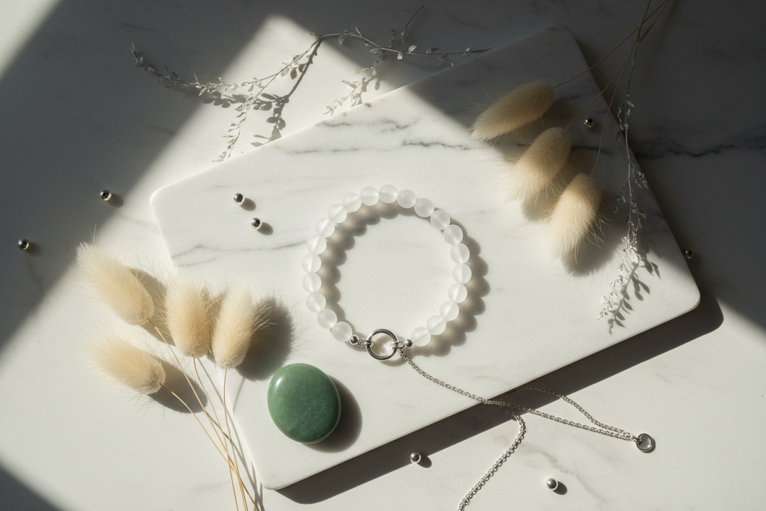A handcrafted lineage-validated master healer crystal bracelet resting near a peaceful meditation space.