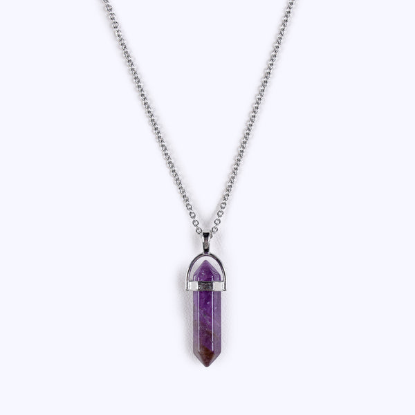 Front view studio product photograph of the single-terminated amethyst geometric point necklace centered on a clean white background, showcasing its rich purple color gradients and sharp crystal edges.